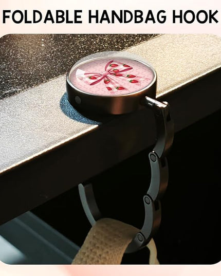 YAZMEEN Pink Bow Foldable Purse Hook for Table, Strawberry Bow, Women's Handbag Hanger Holder, Portable Purse Table Hanger, Funny Desk Hook Gifts for Women Mom Wife Sister Friend Bestie Colleague