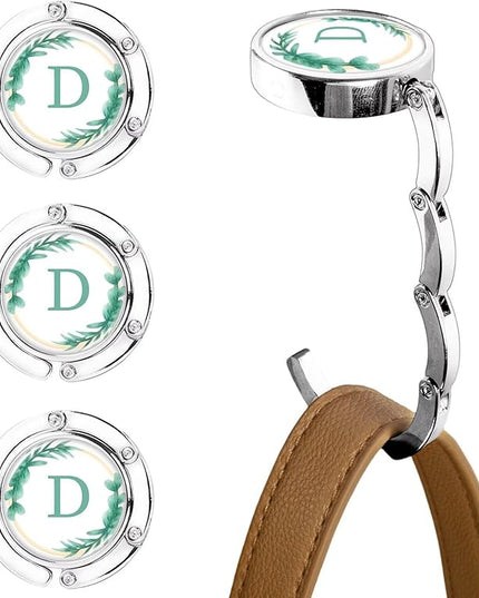 XSUIOY 3Pcs Personalized Initial Foldable Purse Hook for Table,Crushed Flower Letters Folding Purse Hanger,Purse Holder Handbag Hanger Collection Desk Table Bag Hooks Gifts for Women Bag(Green-D)