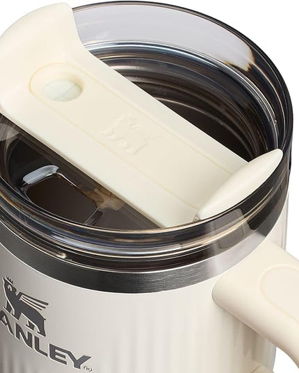 STANLEY Quencher H2.0 Tumbler with Handle and Straw 20 oz | Flowstate 3-Position Lid | Cup Holder Compatible for Travel | Insulated Stainless Steel Cup | BPA-Free | Fluted Cream Gloss