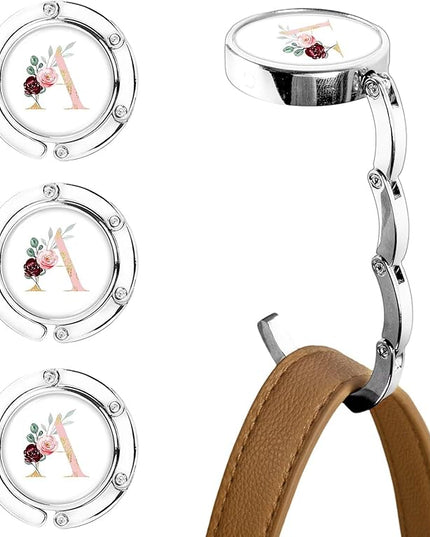 XSUIOY 3Pcs Personalized Initial Foldable Purse Hook for Table,Crushed Flower Letters Folding Purse Hanger,Purse Holder Handbag Hanger Collection Desk Table Bag Hooks Gifts for Women Bag(Pink-A)