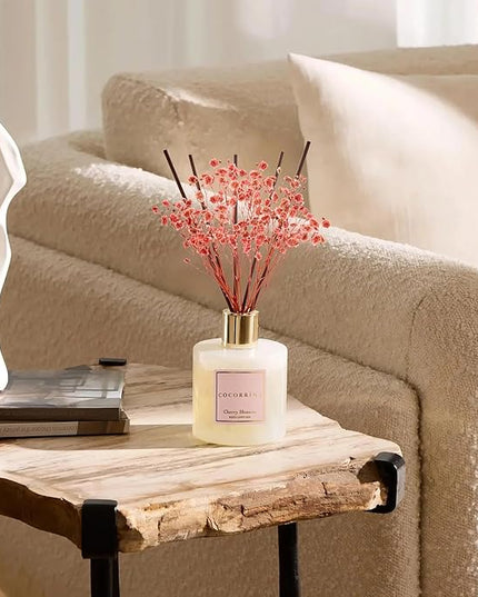 COCORRÍNA Reed Diffuser - Cherry Blossom 6.7 Fl.oz Reed Diffuser Set with Sticks & Preserved Baby's Breath, Reed Diffuser for Home Bathroom Shelf Decor